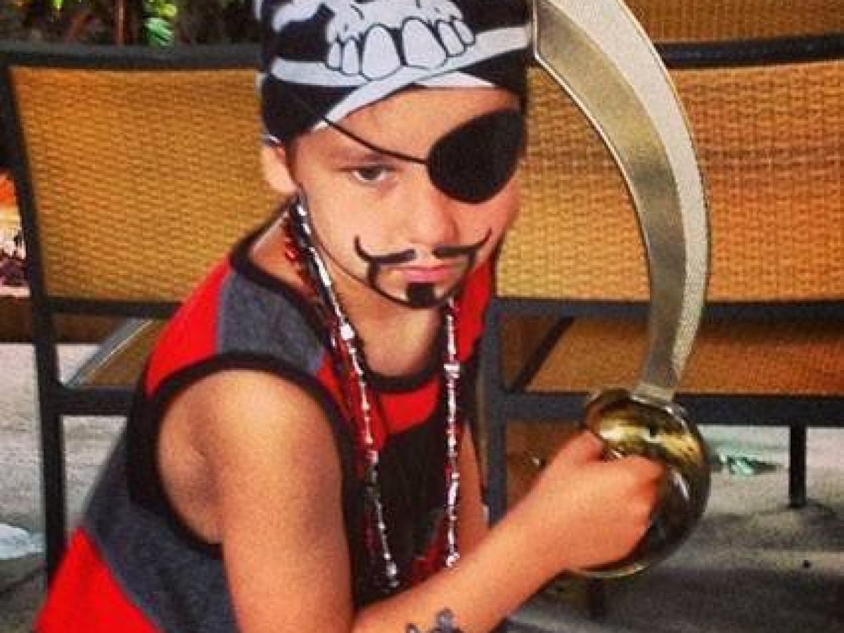 a child dressed as a pirate