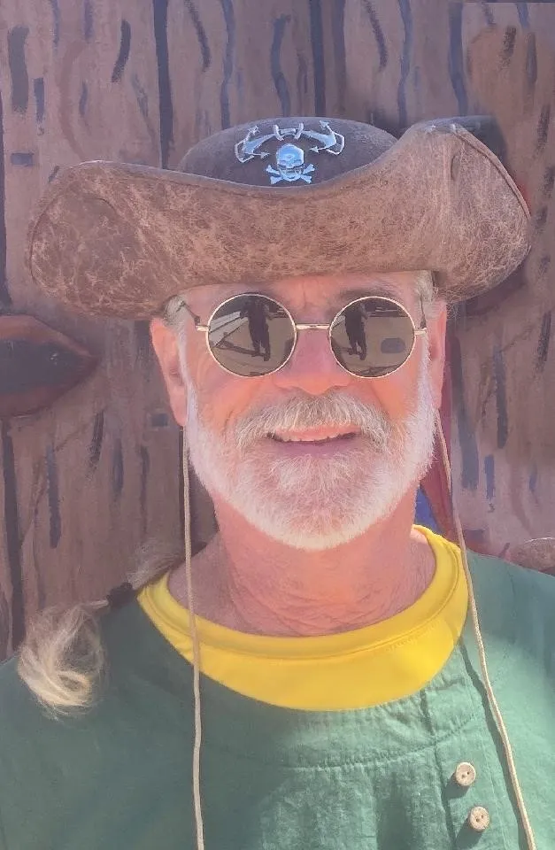 Pirates on fort myers beach a man wearing a hat and glasses
